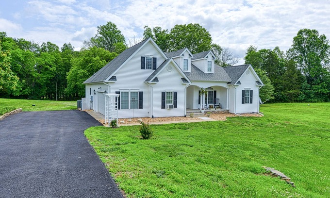 Livingston House | Peaceful lakeside retreat with hot tub, private pool, dock & paddle boards