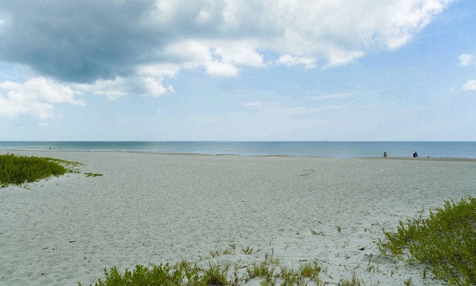 Cocoa Beach House | Pet friendly fenced yard, 4 minute walk to the beach. Close to restaurants