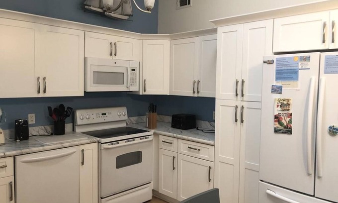 Ship Bottom House | Pet friendly. Ocean Block. Ship Bottom. Beach Badges. Beach equipment. Elevator. Game room. Roof top deck. Private yard. Three lower level bedrooms. Walk to everything Ship Bottom has to offer! Pizza; ice cream; mini-golf; adult libations; etc.