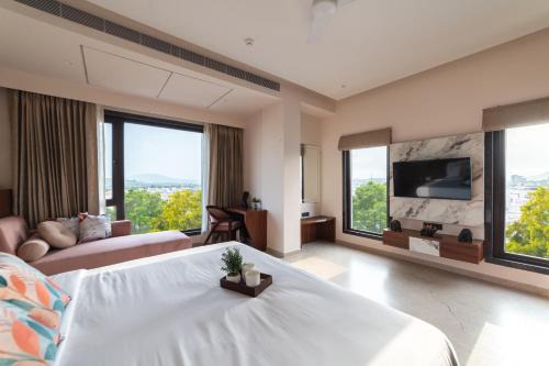 Shavri Colony Hotel | PINNACLE Udaipur - Boutique Rooftop Pool Hotel, Near the Lakes