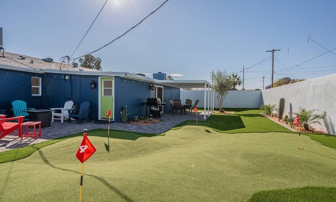 Papago Parkway House | Play on the putting green, and enjoy quality time at this amazing home