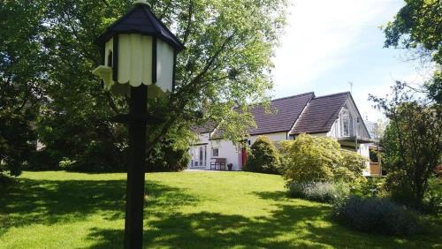 Llanllwchaiarn House | Pond Cottage