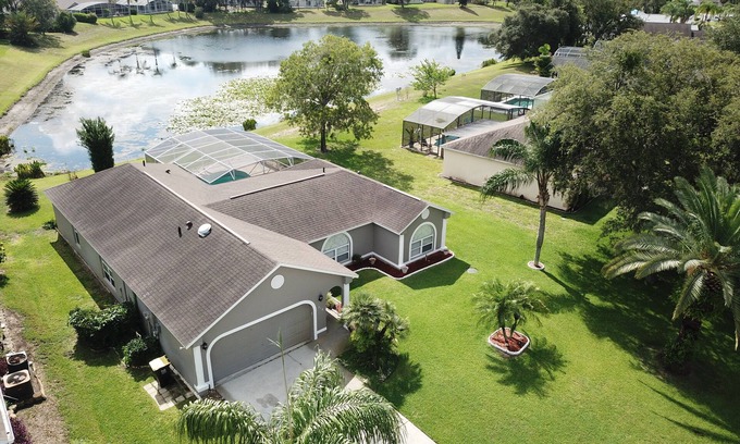 Sunridge Woods House | Pondside Paradise Beautiful 4 bedroom pond facing pool home