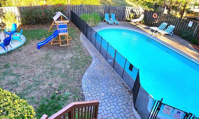 McAlpine House | Poolside Retreat - spacious 4-bedroom retreat with pool, hot tub, game room&more