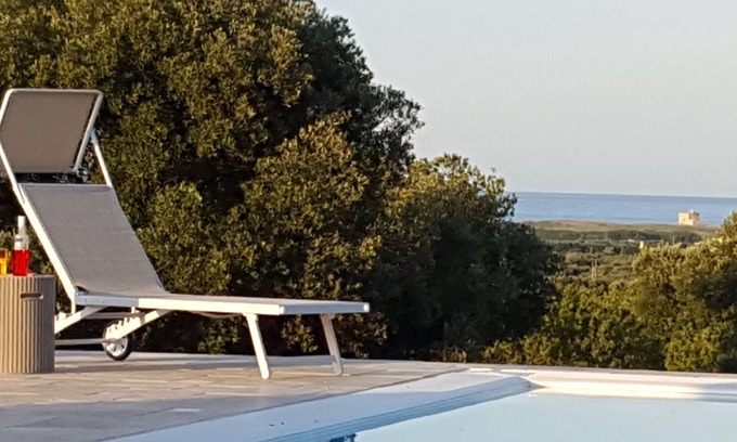 Serranova Villa | Poolside villa with a view among ancient olive trees