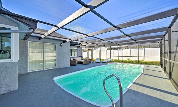 Orchid Lake Village House | Port Richey Getaway w/Lanai, Pool & Grill!