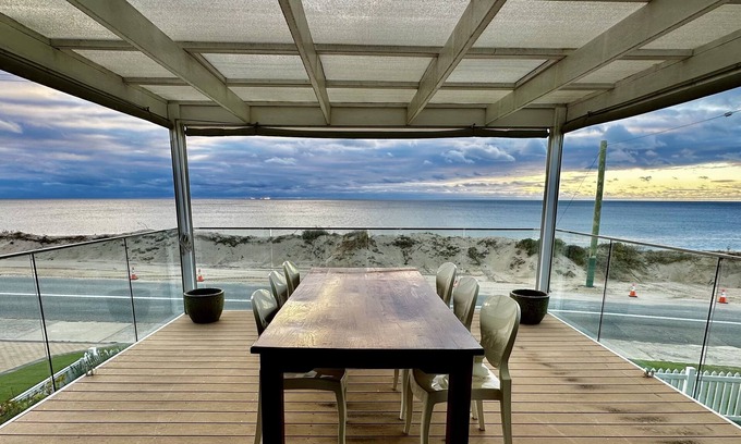 Halls Head Villa | PRIME BEACHFRONT. PRIME VIEWS. PRIME TIME. Elegance, with mobility elevator.