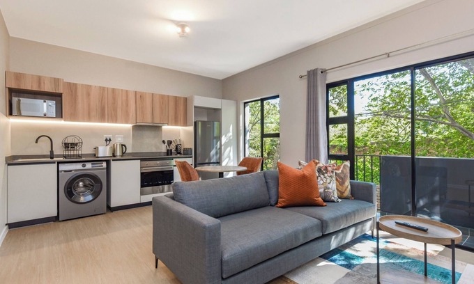 Greater Johannesburg Metropolitan Area Apartment | Private Balcony and Lush Comfort | Elegant Apartment