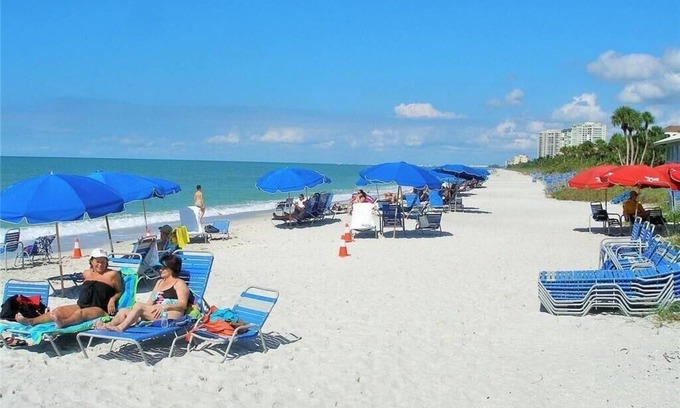 Pelican Bay Condo | Private beach on the Gulf of Mexico -Resort style pool -5 star restaurants n