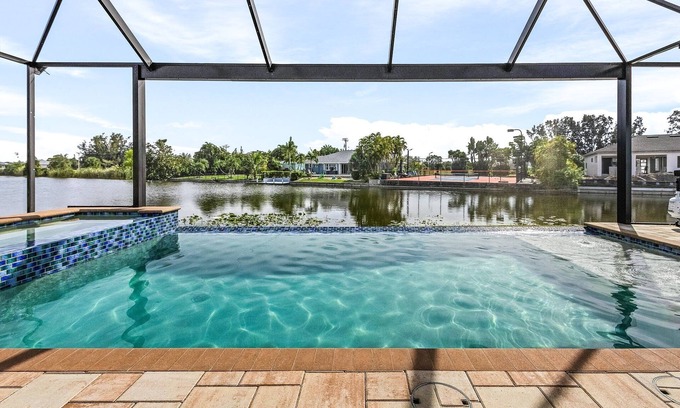 Burnt Store House | Private Beach with volleyball, Saltwater pool & spa - Villa Siren Calling - Roelens Vacations