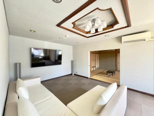 Tobetsu Apartment | Private house Oheso 40minutes from Sapporo,4 free parking, long stay,16people