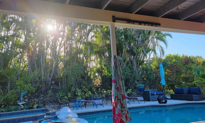 Iona House | Private Oasis in quiet neighborhood heated pool and spa surrounded palms.