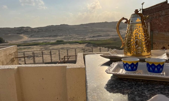 Giza Hotel | pyramids view inn To Pyramids , 4-bedroom hotel with AC and WiFin tranquil Giza