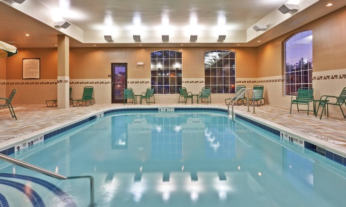 Rochester Condo | Queen Suite with In-Suite Conference Space Near the University of Rochester