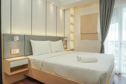 East Jakarta Apartment | Quiet Studio Room Signature Park Grande Apartment By Travelio