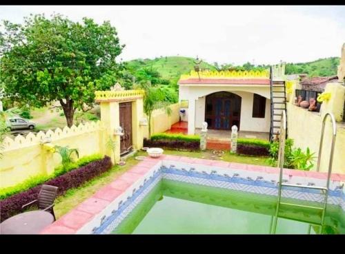 Udaipur District Resort | Rayta cottege villa