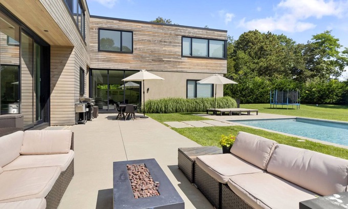 Shinnecock Hills House | Recently constructed modern-style home with a gated entrance, private pool,.
