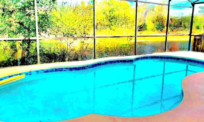 Lindfields Villa | Ref 994PF. Modern lake view pool home. Very close to Disney
