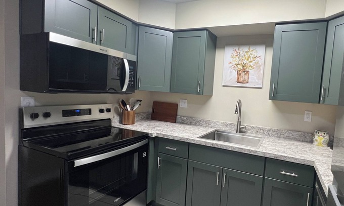 Lansing Apartment | Refreshed comfort in Lansing with new Kitchen - Walkable to Sparrow and Downtown