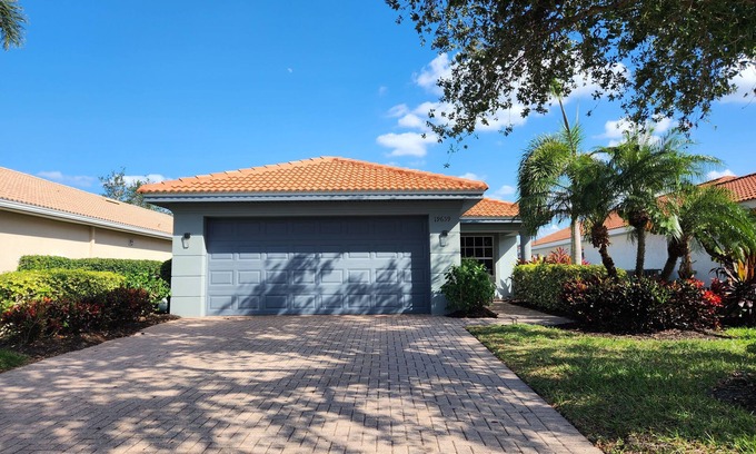Cascades House | Refreshing Lake View Home in Upscale Estero Community