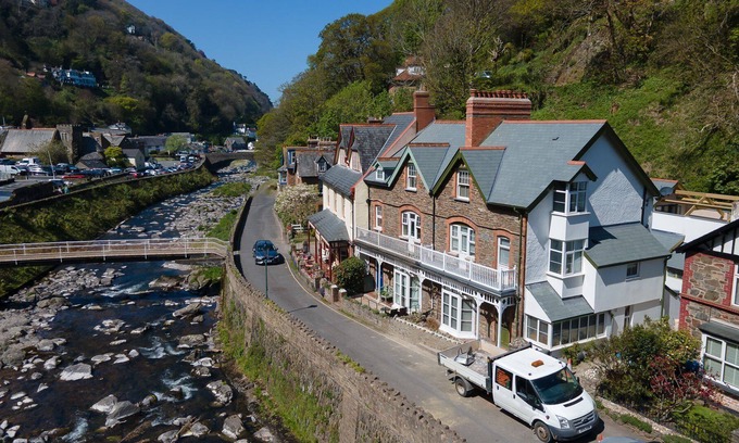 Lynmouth House | Refurbished riverside cottage sleeps 8 walking distance to the beach