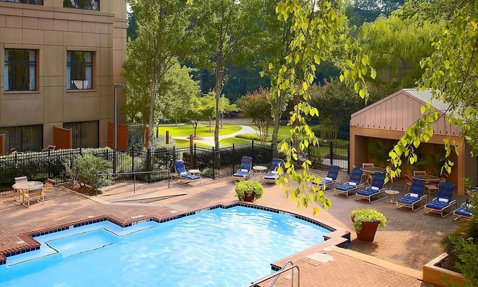 Gwinnett Place Hotel | Relax and Unwind! Enjoy Spacious unit w/Kitchen. Swimming Pool Access & Parking