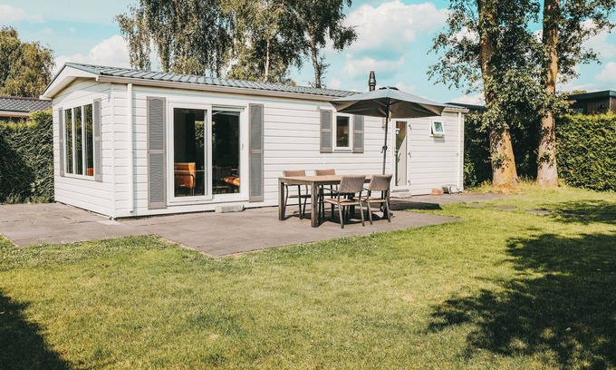 Voorthuizen House | Relax in the Veluwe Lodge with private sauna! Luxury, nature, and comfort come together at De Boshoek for a perfect getaway.