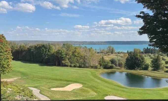 Kewadin Condo | Relax & Unwind | Overlooks Hole 8 + Torch Lake