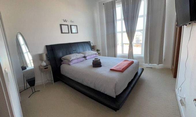 Airdrie House | Relax & unwind in this cozy 3-Bedroom Airdrie Townhome