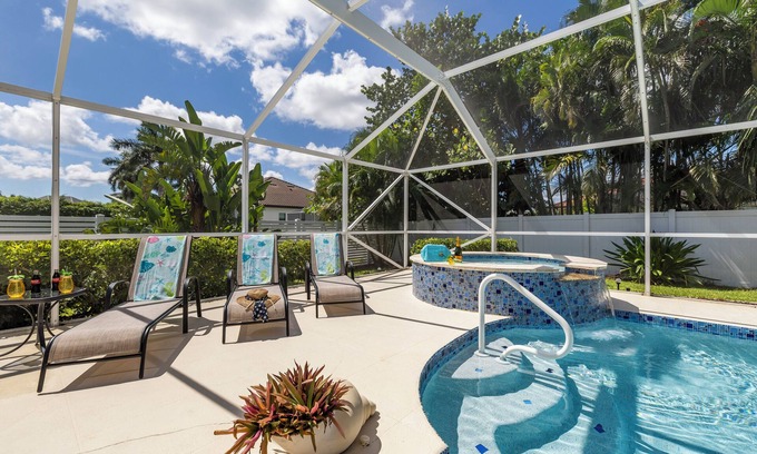 Pelican House | Relaxing outdoor with pool and hot tub!