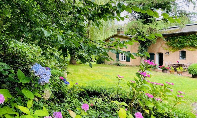 Scheggerott House | Relaxing vacation in stylish house with park-like garden, grand piano, library