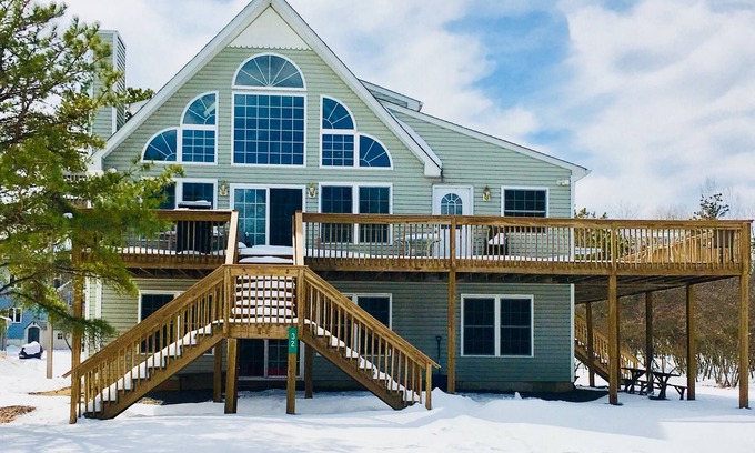 Albrightsville Villa | Remodeled ! Lakeside 9BR Pocono Area Villa and private beach volley ball court