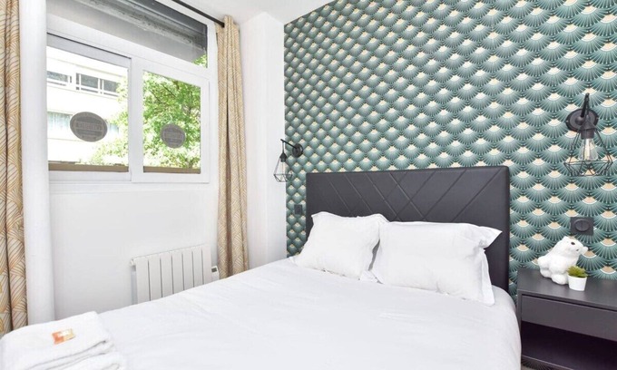 Quartier de la Folie-Mericourt Apartment | Renovated 2BD apartment in Parc Belleville