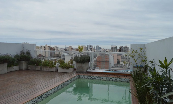 Balvanera Apartment | RentUp-Mono moderno con balcón y piscina