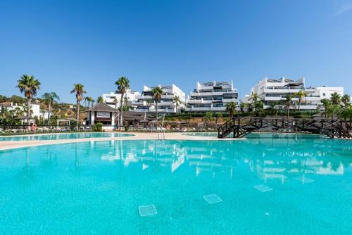 Estepona Apartment | Resort Apartment with Garden & Views