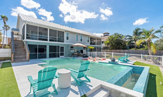 Mid Island House | Resort Oasis 4-bed/4.5 bath + Pool + Boat & Jet Ski Lifts, Game Room + Gym!