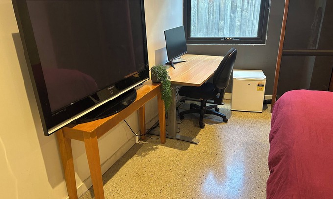 Doncaster East House | Retreat to a quiet private downstairs space with wellbeing options
