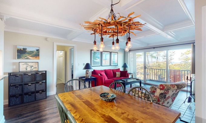 Glen Arbor Condo | Riverfront condo with beach access to lake, fireplace, furnished deck & cable