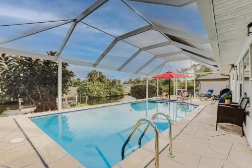 Port Charlotte House | Riverfront Florida Retreat with Pool, Patio and Grill!