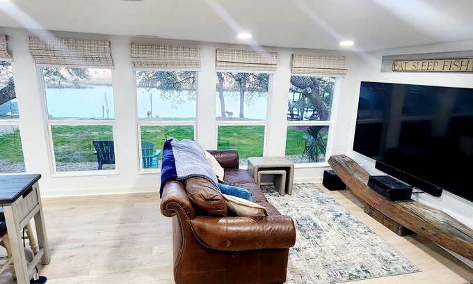 Carrabelle House | Riverfront Retreat- Fishing Dock, Screen Porch, Shaded Lawn, Adirondack Chairs