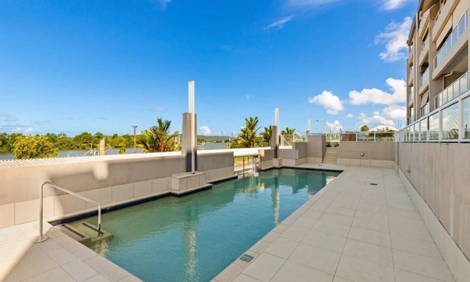 Innisfail Apartment | Riverside Luxe Penthouse Escape