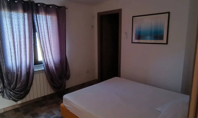 Villacidro Apartment | Room 'Camera - Pisicinirgas' with Mountain View, Wi-Fi and Air Conditioning