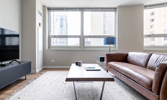 Rush and Division Apartment | Roomy River North 2BR w/Gym, Deck & Pool, walk to Mag Mile, by Blueground