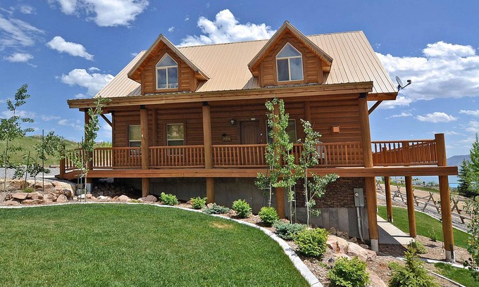 Harbor Village Cabin | Rustic cabin with lake views from deck w/grill, foosball, W/D, fireplace