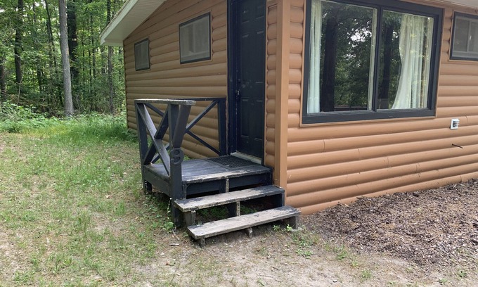 Sand Creek Cabin | Rustic cabins in secluded campground with lake access and woods to wander in.