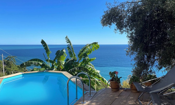 Ventimiglia House | Rustic house panoramic view terraces and pool