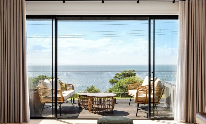 San Remo House | San Remo Luxe 1, large modern home with 180-degree bay views, outdoor spa.