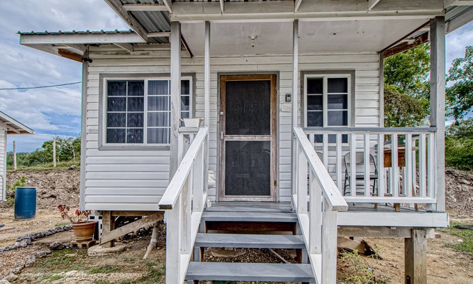 Georgeville Cabin | Scenic hilltop studio with shared plunge pool, kitchenette, AC, & WiFi