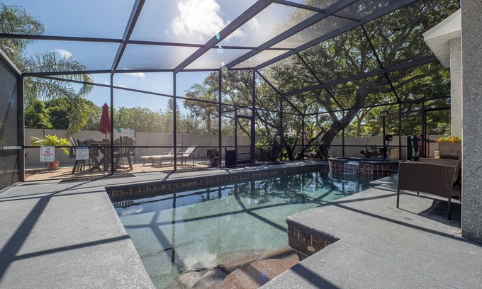Vilano Beach House | Screened Heated Pool & Hot Tub with Golf Cart - ONE Block to the BEACH!