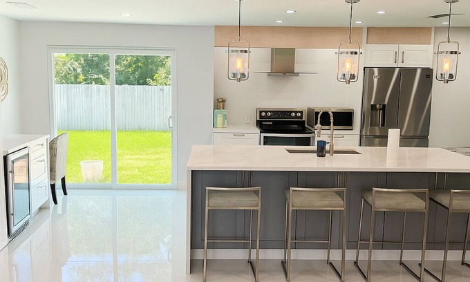 Central Naples House | Seabreeze, beautifully renovated coastal home just 1.5 miles from Naples beaches
